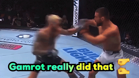 Two Men Are Fighting In A Boxing Ring With The Words Gamrot Really Did That Above Them GIF