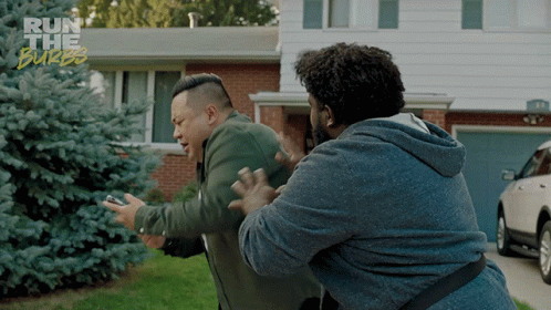 Two Men Are Fighting In Front Of A House With The Words Run The Burbs On The Bottom GIF