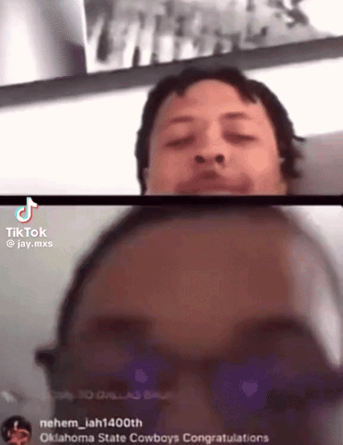 Two Men Are Having A Video Call And One Of Them Is Wearing Glasses GIF