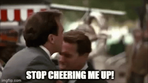 Two Men Are Kissing Each Other And The Words `` Stop Cheering Me Up '' Are Written On The Screen . GIF