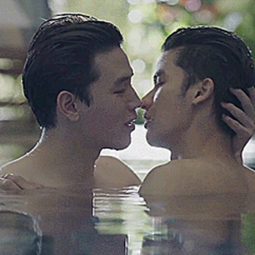 Two Men Kissing In Water Pool GIF