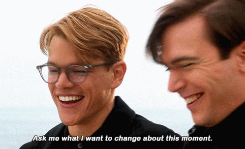 Two Men Are Laughing And One Of Them Says Ask Me What I Want To Change About This Moment GIF