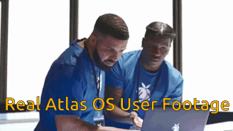 Two Men Looking At Laptop With Real Atlas OS Footage GIF