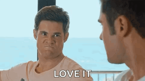 Two Men Are Looking At Each Other And One Of Them Is Making An Angry Face . GIF