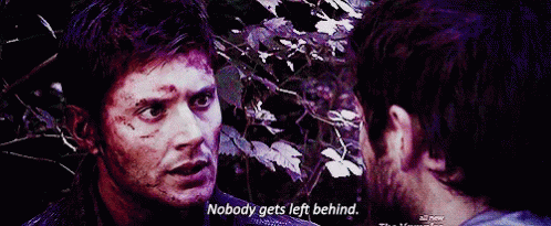 Two Men Are Looking At Each Other And One Of Them Is Saying Nobody Gets Left Behind GIF