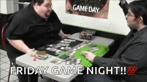 Two Men Are Playing A Game Of Cards At A Table With The Words Friday Game Night . GIF
