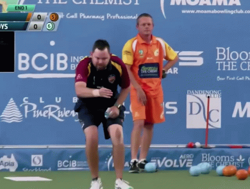 Two Men Are Playing Bowling In Front Of A Sign That Says Bcib GIF