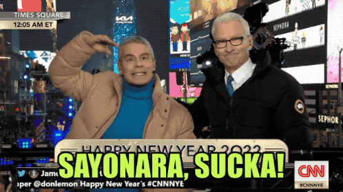 Two Men Posing In Front Of Sayonara Sucka Sign GIF