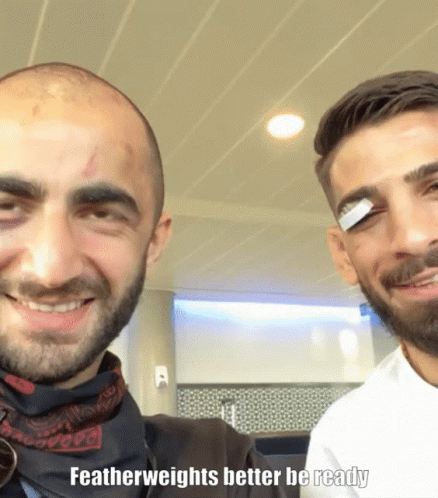 Two Men Are Posing For A Picture With The Caption " Featherweights Better Be Ready " On The Bottom GIF