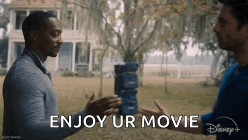 Two Men Are Shaking Hands In Front Of A House And The Words `` Enjoy Ur Movie '' Are Written On The Bottom . GIF
