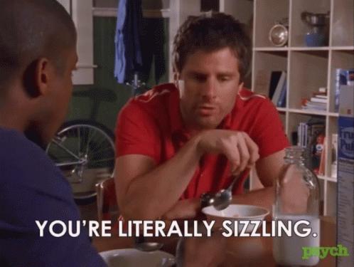 Two Men Are Sitting At A Table And One Of Them Is Saying " You 'Re Literally Sizzling .. " GIF