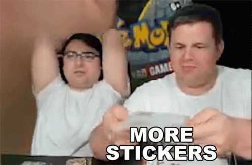 Two Men Are Sitting At A Table With Their Arms In The Air And The Words `` More Stickers '' . GIF