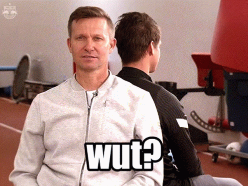 Two Men Are Sitting Back To Back And One Of Them Has The Word Wut On His Shirt GIF