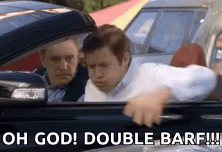 Two Men Are Sitting In A Car With The Words `` Oh God ! Double Barf !!! '' Written On The Bottom . GIF