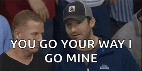 Two Men Are Sitting In A Crowd And One Of Them Is Saying You Go Your Way I Go Mine GIF