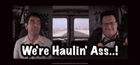 Two Men Are Sitting In A Van And One Of Them Is Saying We 'Re Haulin ' Ass ! GIF