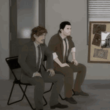 Two Men Sitting In Front Of Bulletin Board GIF