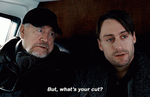 Two Men Are Sitting Next To Each Other And One Of Them Is Asking The Other What 'S Their Cut GIF