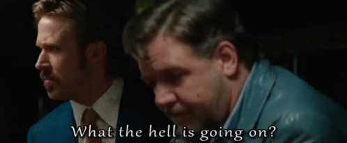 Two Men Are Sitting Next To Each Other And One Of Them Is Saying What The Hell Is Going On . GIF