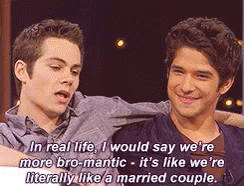 Two Men Are Sitting Next To Each Other And One Of Them Says In Real Life GIF