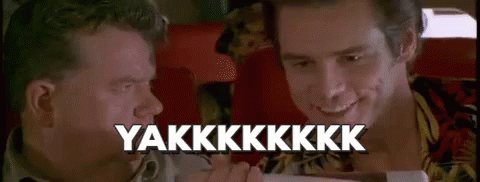 Two Men Are Sitting Next To Each Other In A Chair And One Of Them Is Holding A Remote Control . GIF