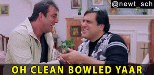 Two Men Are Sitting Next To Each Other In A Living Room With The Caption Oh Clean Bowled Yaar Above Them GIF