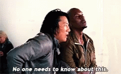 Two Men Are Sitting Next To Each Other In A Room And One Of Them Is Saying `` No One Needs To Know About This . '' GIF
