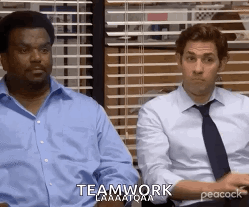 Two Men Are Sitting Next To Each Other In Front Of A Window With Blinds . GIF