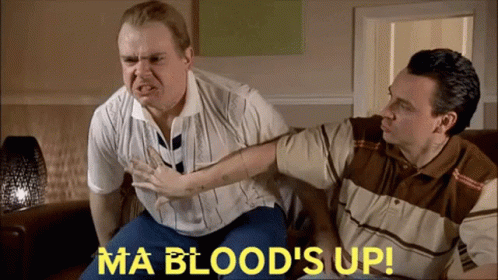 Two Men Are Sitting On A Couch With The Words Ma Blood 'S Up GIF