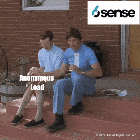 Two Men Are Sitting On A Porch With Anonymous Lead Written In The Corner GIF