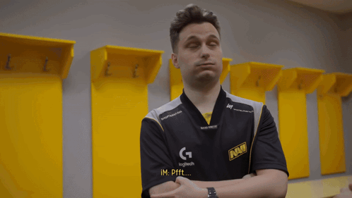 Two Men Are Standing In A Locker Room And One Of Them Is Talking To The Other GIF