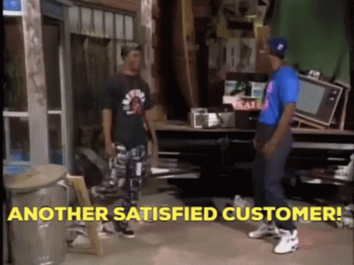 Two Men Are Standing In A Room With The Words " Another Satisfied Customer " In Yellow Letters GIF