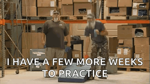 Two Men Are Standing In A Warehouse With The Words I Have A Few More Weeks To Practice GIF