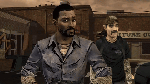 Two Men Are Standing In Front Of A Building That Says Iture GIF