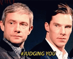 Two Men Are Standing Next To Each Other And One Of Them Is Saying # Judging You . GIF