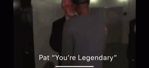 Two Men Are Standing Next To Each Other And One Of Them Is Saying Pat " You 'Re Legendary " GIF