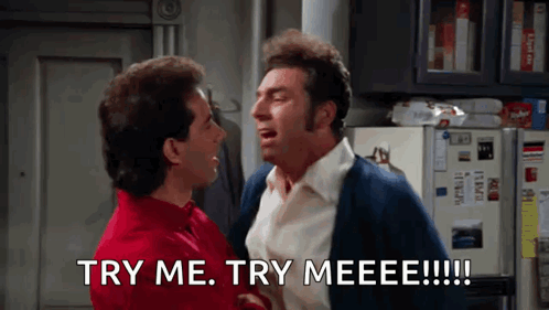 two men are standing next to each other and one of them is saying try me try meeeee