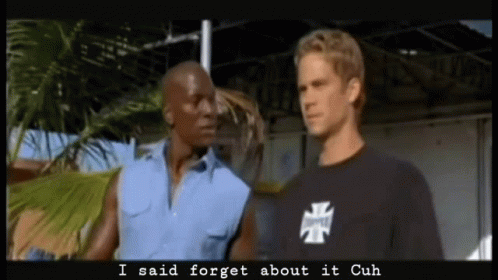Two Men Are Standing Next To Each Other And One Of Them Is Wearing A Shirt That Says I Said Forget About It Cuh GIF
