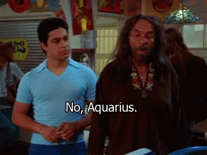 Two Men Are Standing Next To Each Other And One Of Them Says " No Aquarius " GIF