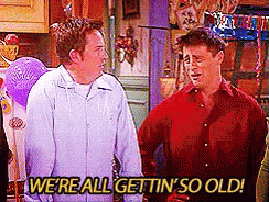 Two Men Are Standing Next To Each Other And Saying We 'Re All Gettin ' So Old . GIF