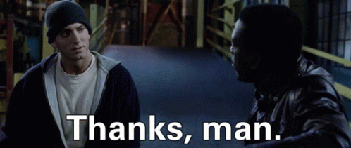Two Men Are Standing Next To Each Other And The Words Thanks Man Are Written In White GIF