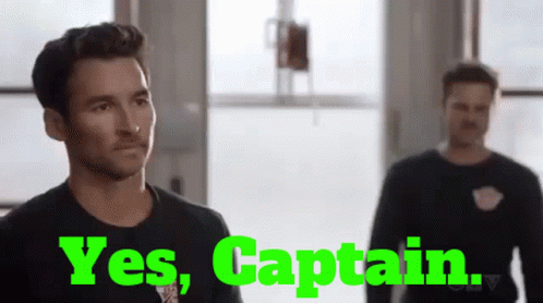 Two Men Are Standing Next To Each Other And The Words Yes Captain Are Displayed GIF