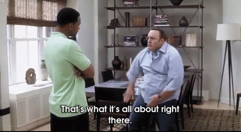 Two Men Are Standing Next To Each Other In A Living Room And One Of Them Says That 'S What It 'S All About Right There GIF