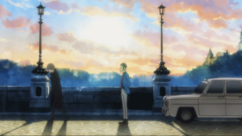 Two Men Are Standing Next To Each Other In Front Of A White Car GIF
