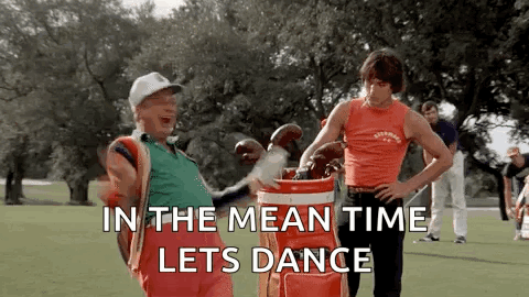 Two Men Are Standing Next To Each Other On A Golf Course Holding Golf Clubs And A Golf Bag . GIF