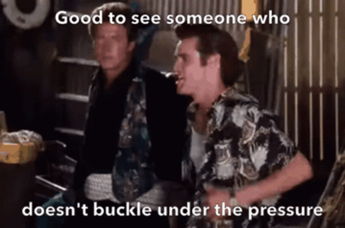Two Men Are Standing Next To Each Other With The Caption " Good To See Someone Who Doesn 'T Buckle Under The Pressure " GIF