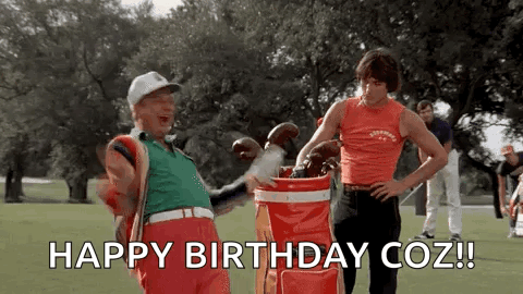 Two Men Are Standing On A Golf Course And One Of Them Is Holding A Golf Bag . GIF