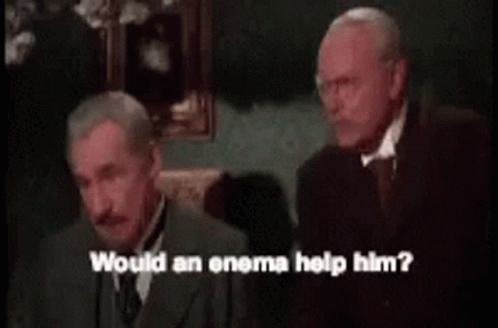 Two Men Are Talking To Each Other And One Of Them Is Asking If An Enema Would Help Him GIF