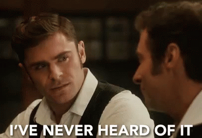 Two Men Are Talking To Each Other In A Bar And One Of Them Is Telling The Other That He Has Never Heard Of It . GIF