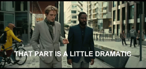 Two Men Are Walking Down A Street With The Words That Part Is A Little Dramatic Behind Them GIF